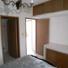 Dormitorio principal con placard y baño en suite