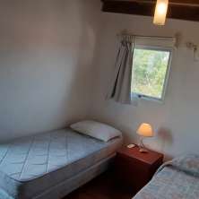 Dormitorio single con aire acondicionado